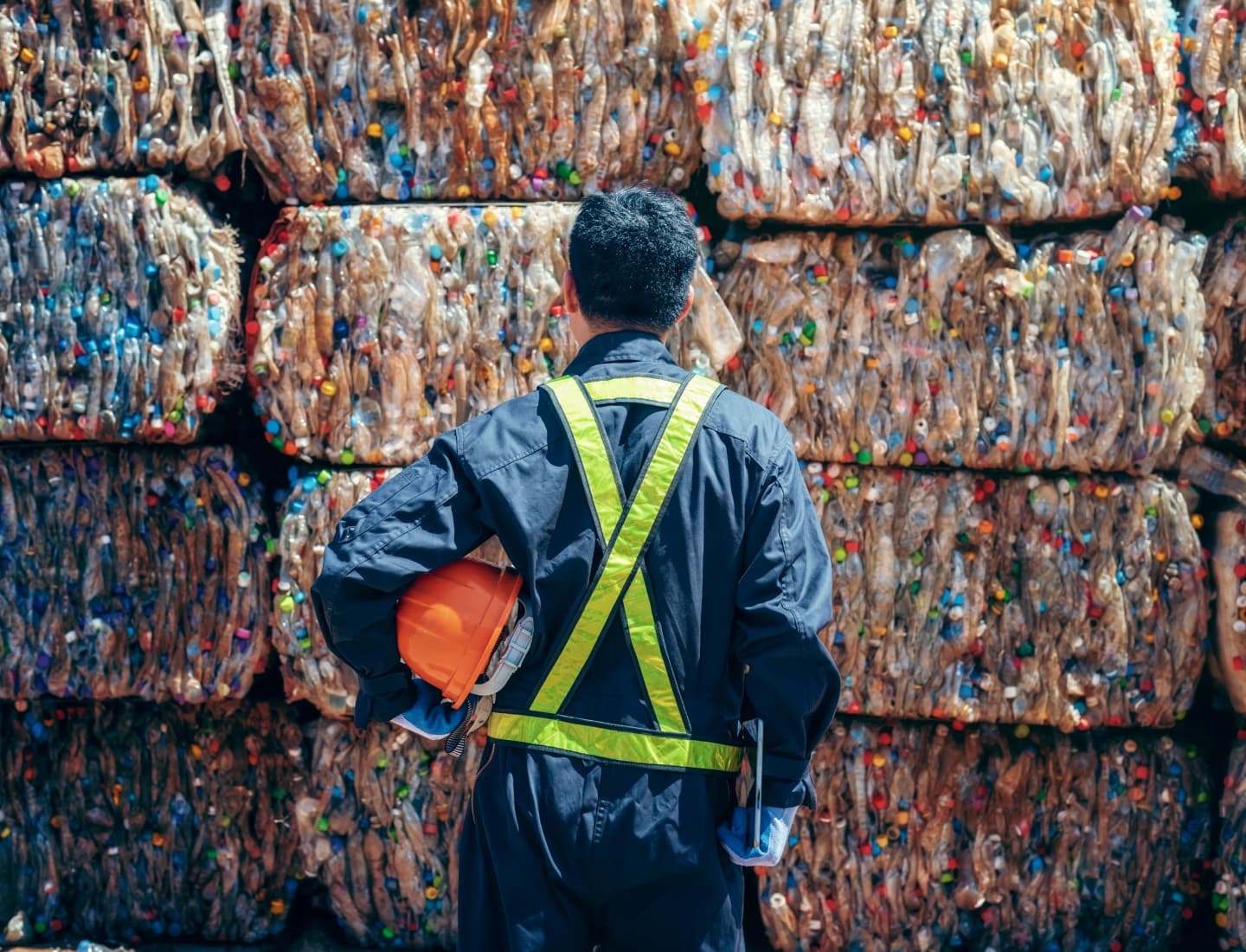 Operator in front of recyclable plastic bales